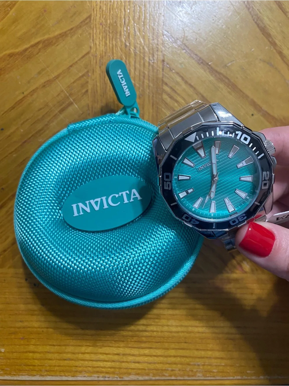 Invicta Men's Silver Watch with Turquoise Dial and Black Bezel
